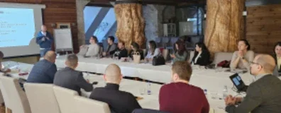 People sitting around the table for a meeting